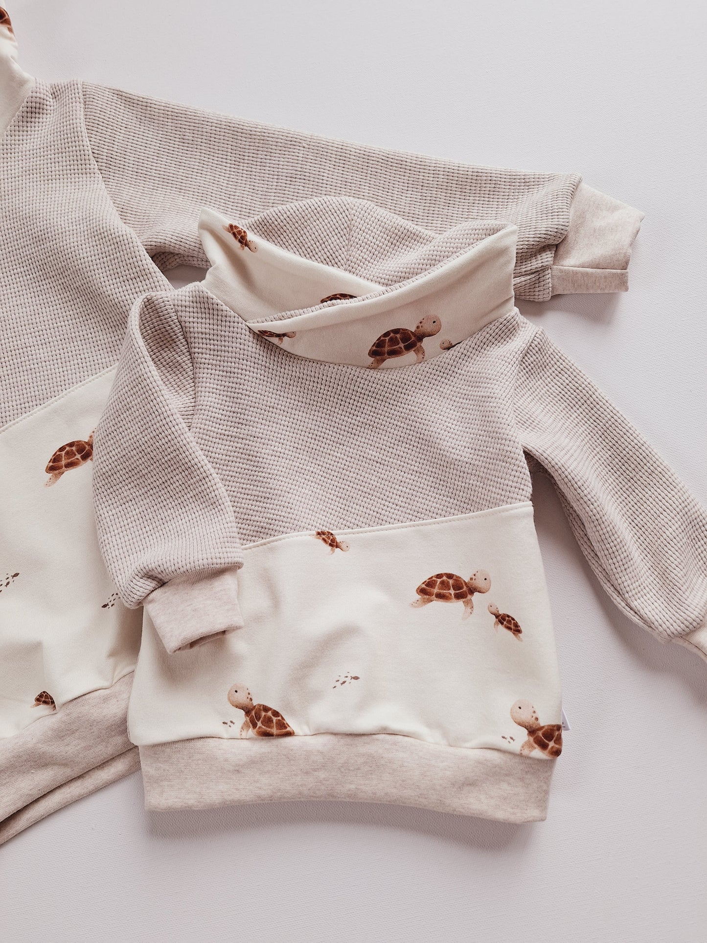 Sweater mit Wickelkragen (verschiedene Designs)