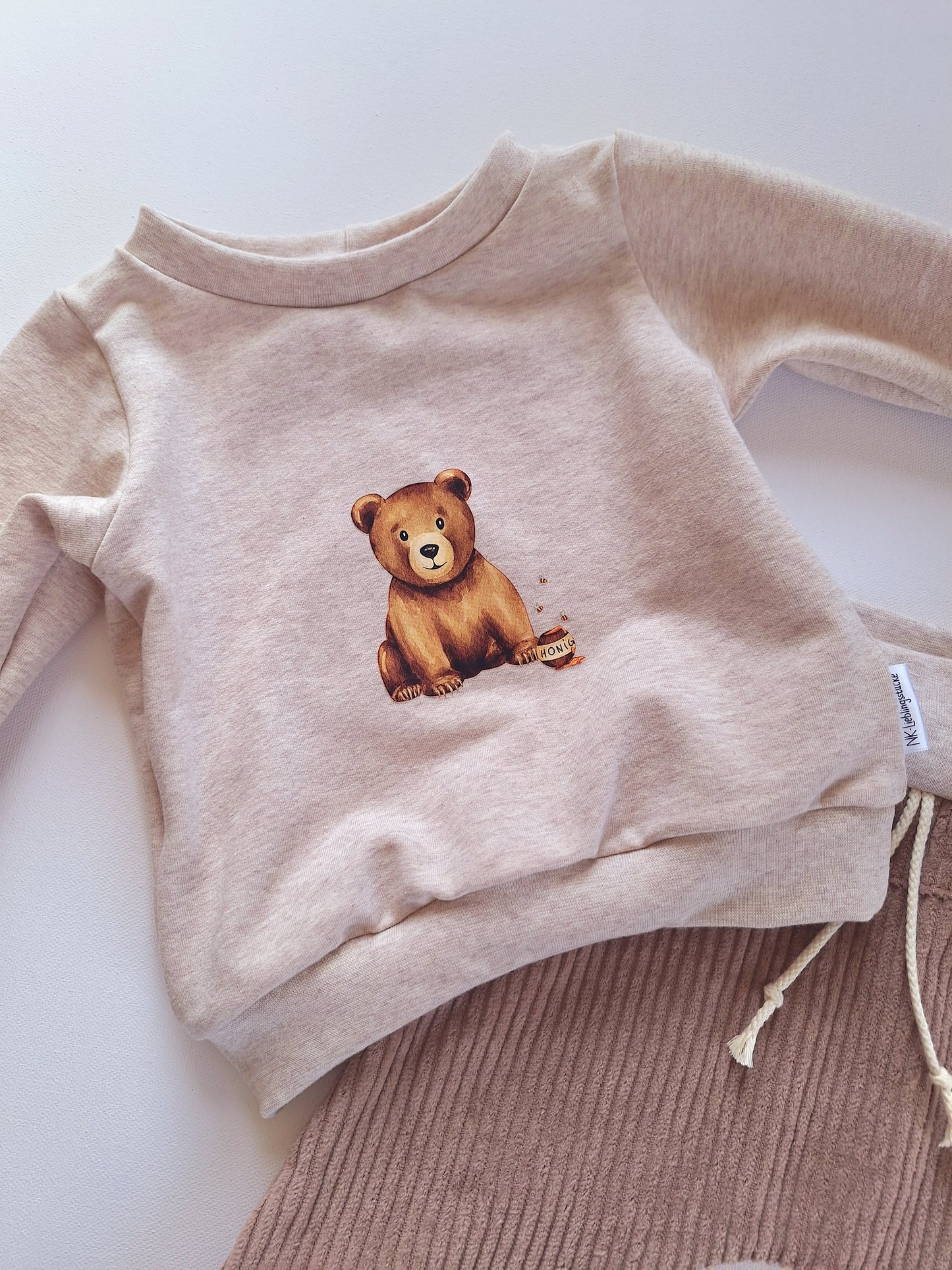 Sweater "creme" kleiner Bär