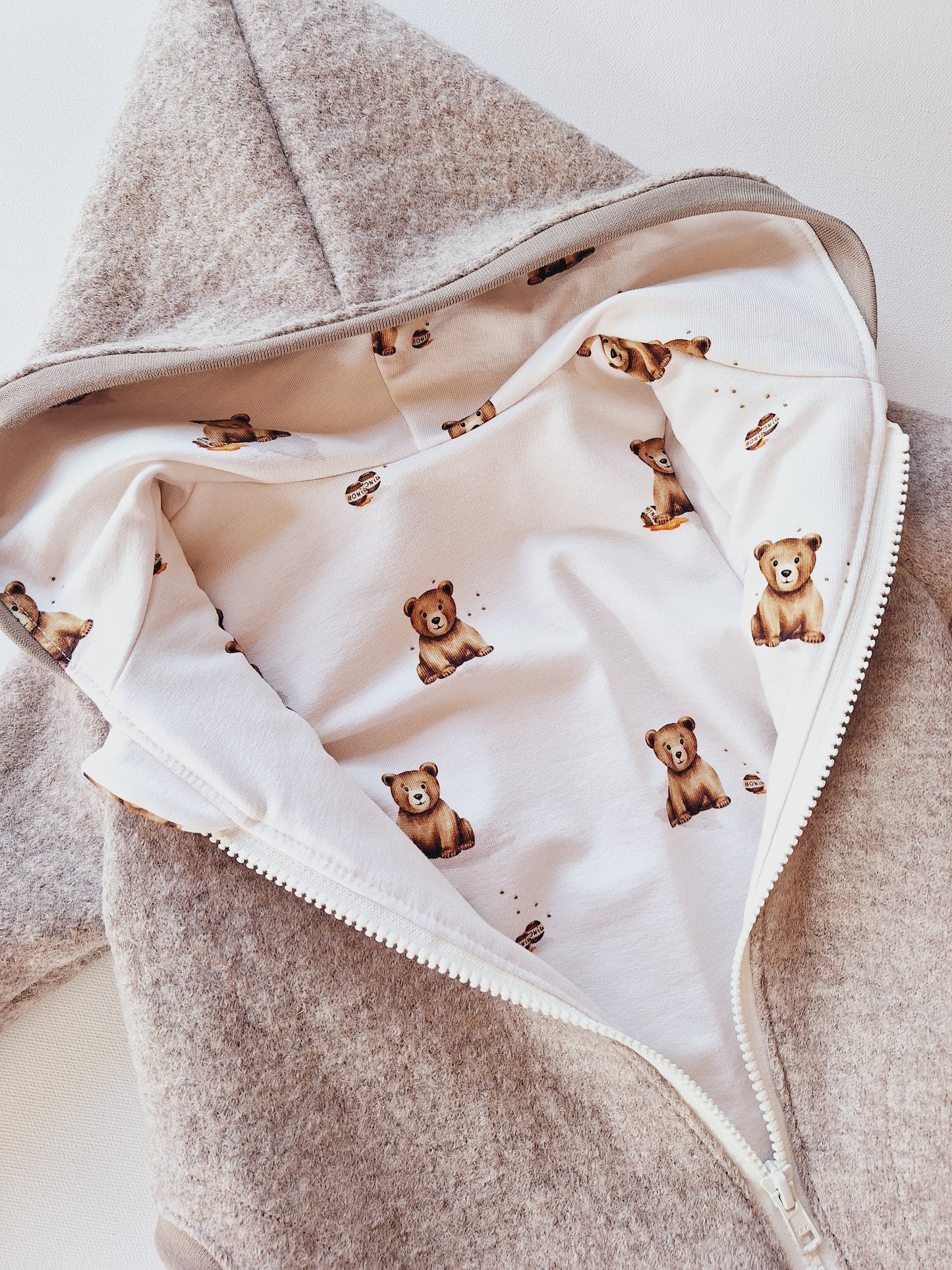 Wollwalk-Overall Creme meliert "Bär" (74)