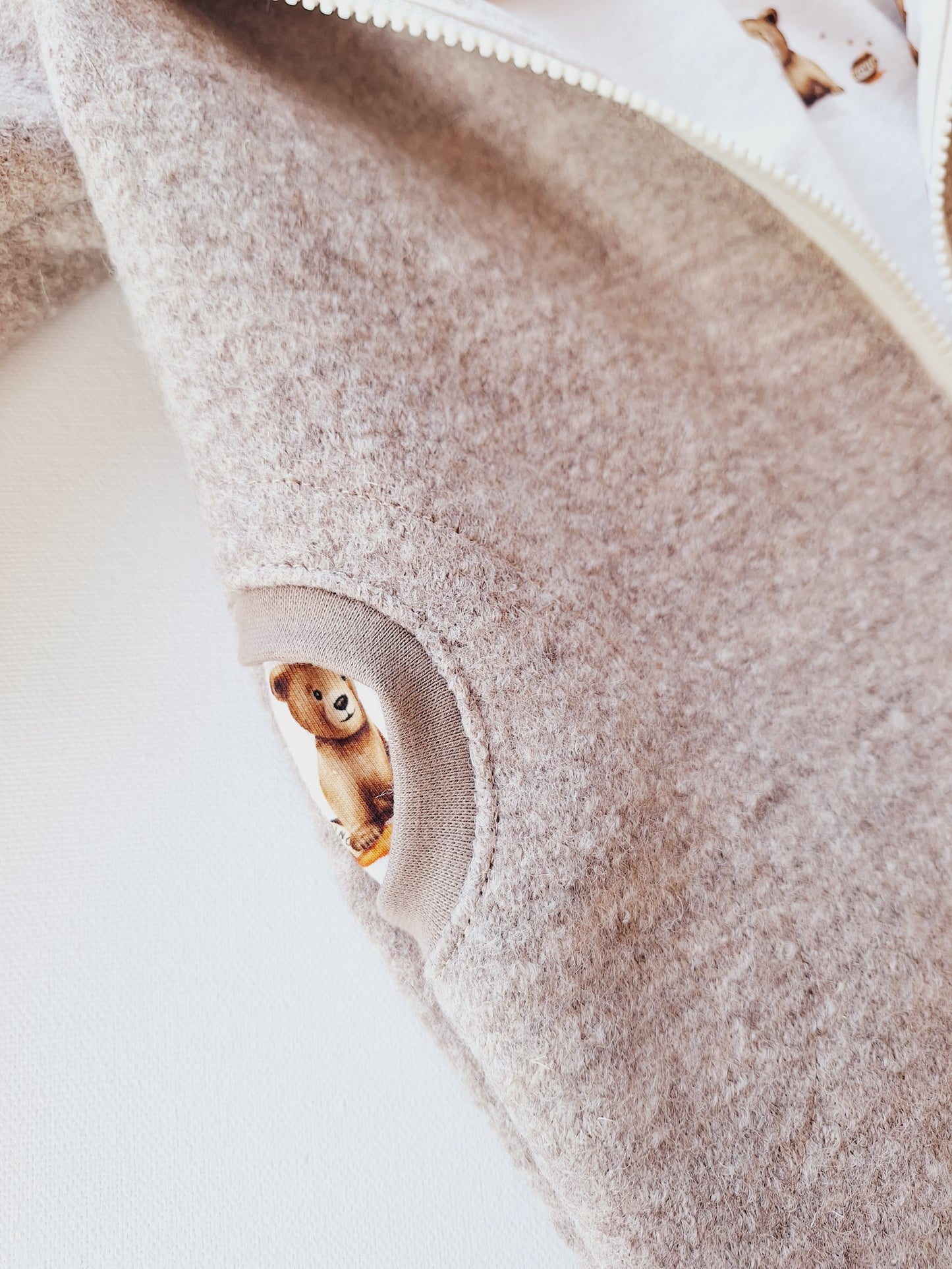 Wollwalk-Overall Creme meliert "Bär" (74)
